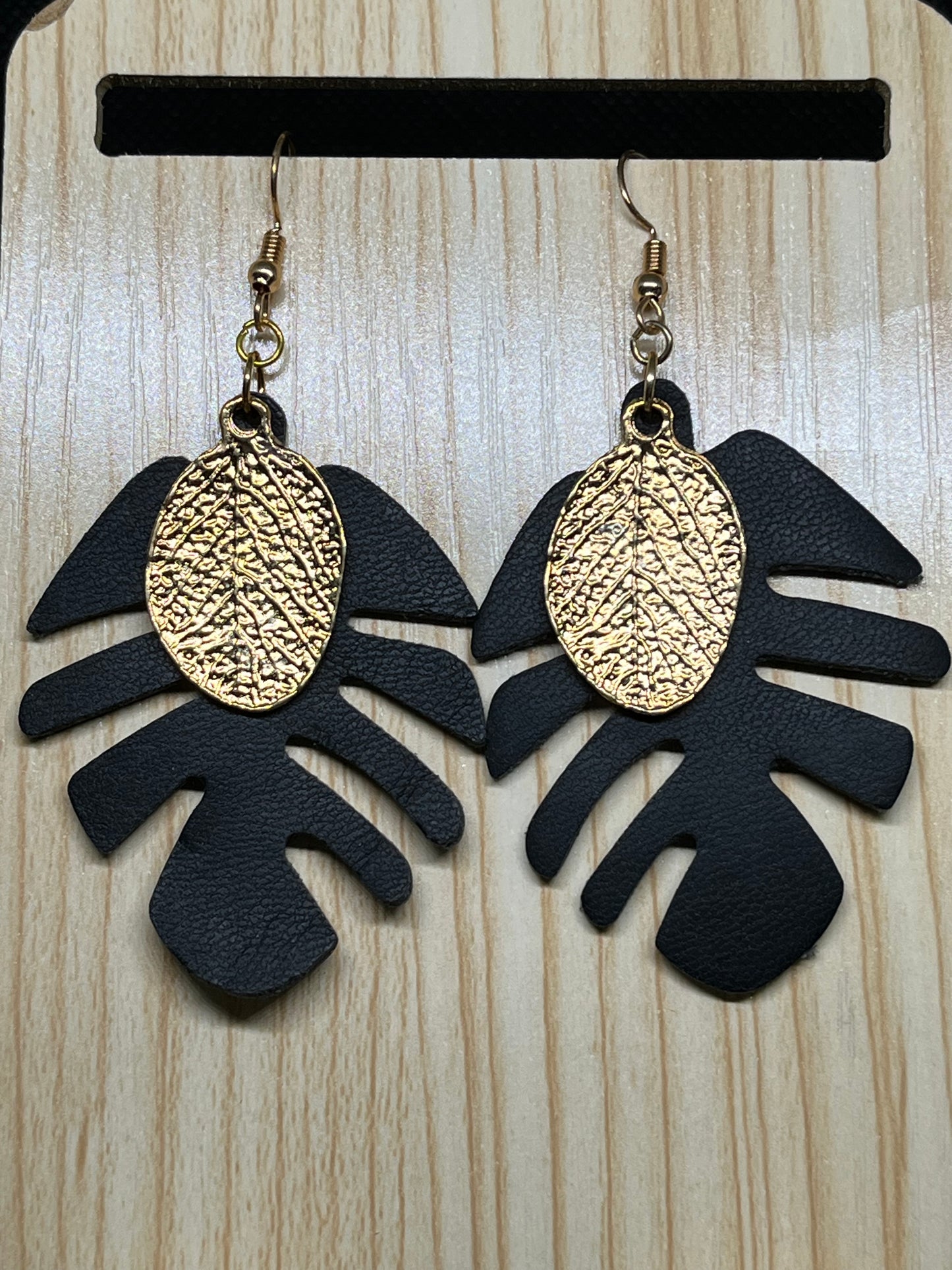 Black leaf with gold leaf charm earrings TK15