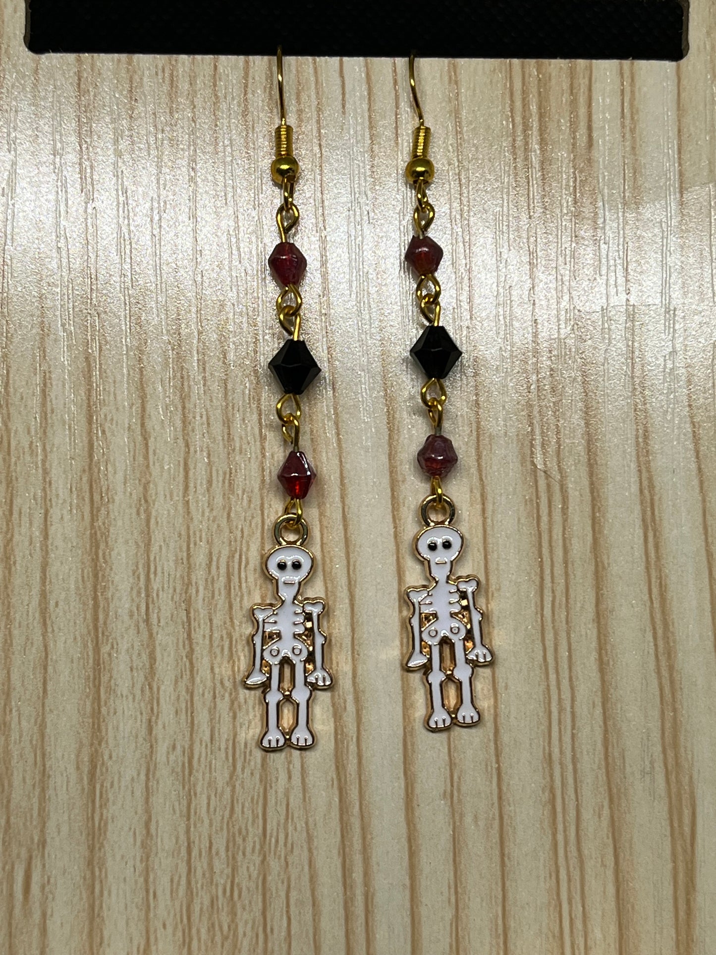 Dangle skeleton earrings H196