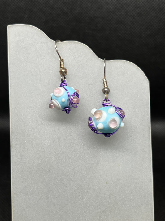 Blue and pink bead wrapped in purple wire earrings E831