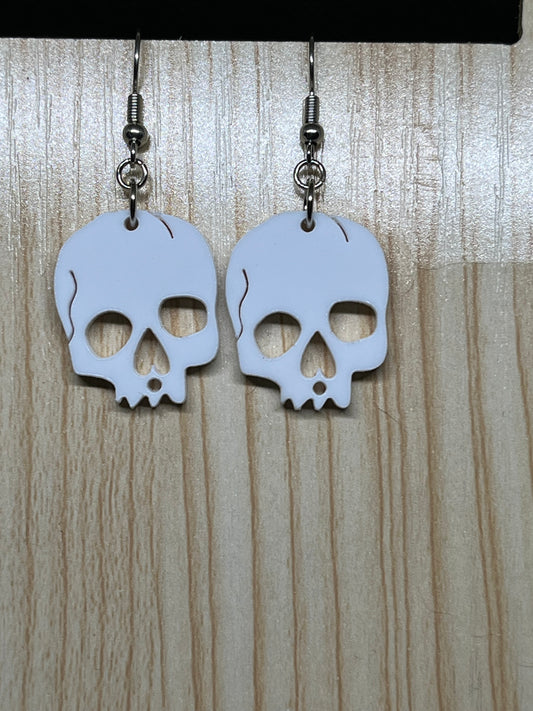 Small white skull earrings H81